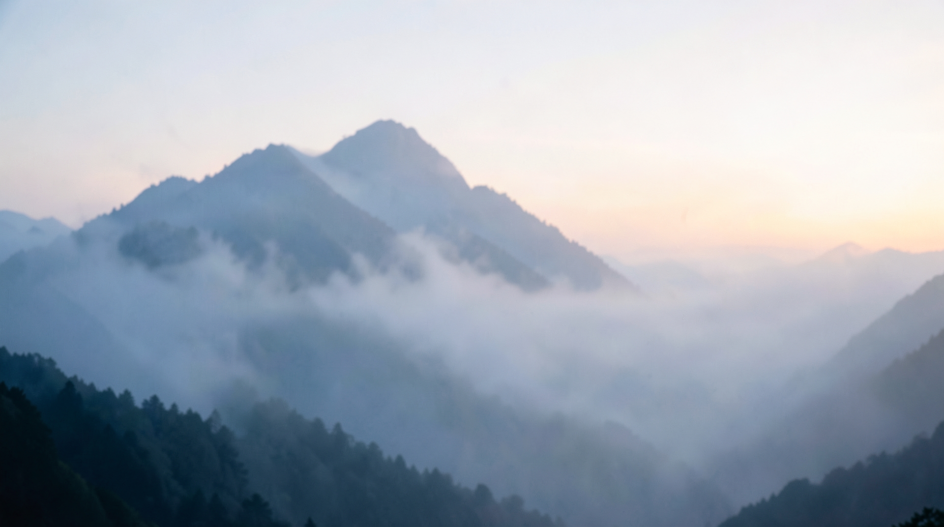 Misty Mountain Peaks at Dawn, Soft Focus, Serene Atmosphere